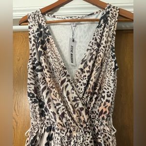 New with tags. Size small. Adorable leopard print Steve Madden romper.